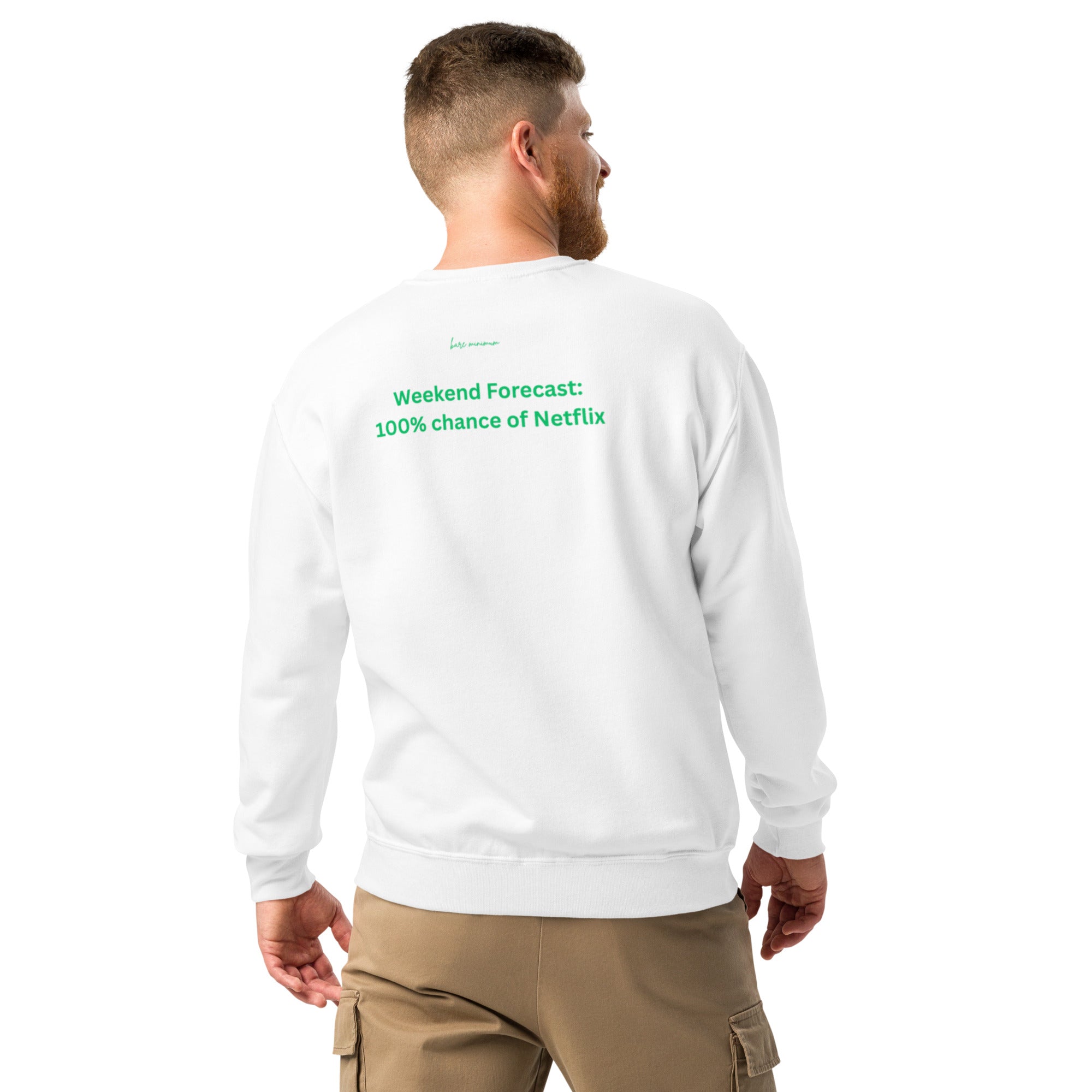 Man wearing a white sweatshirt with text on the back, standing against a white background