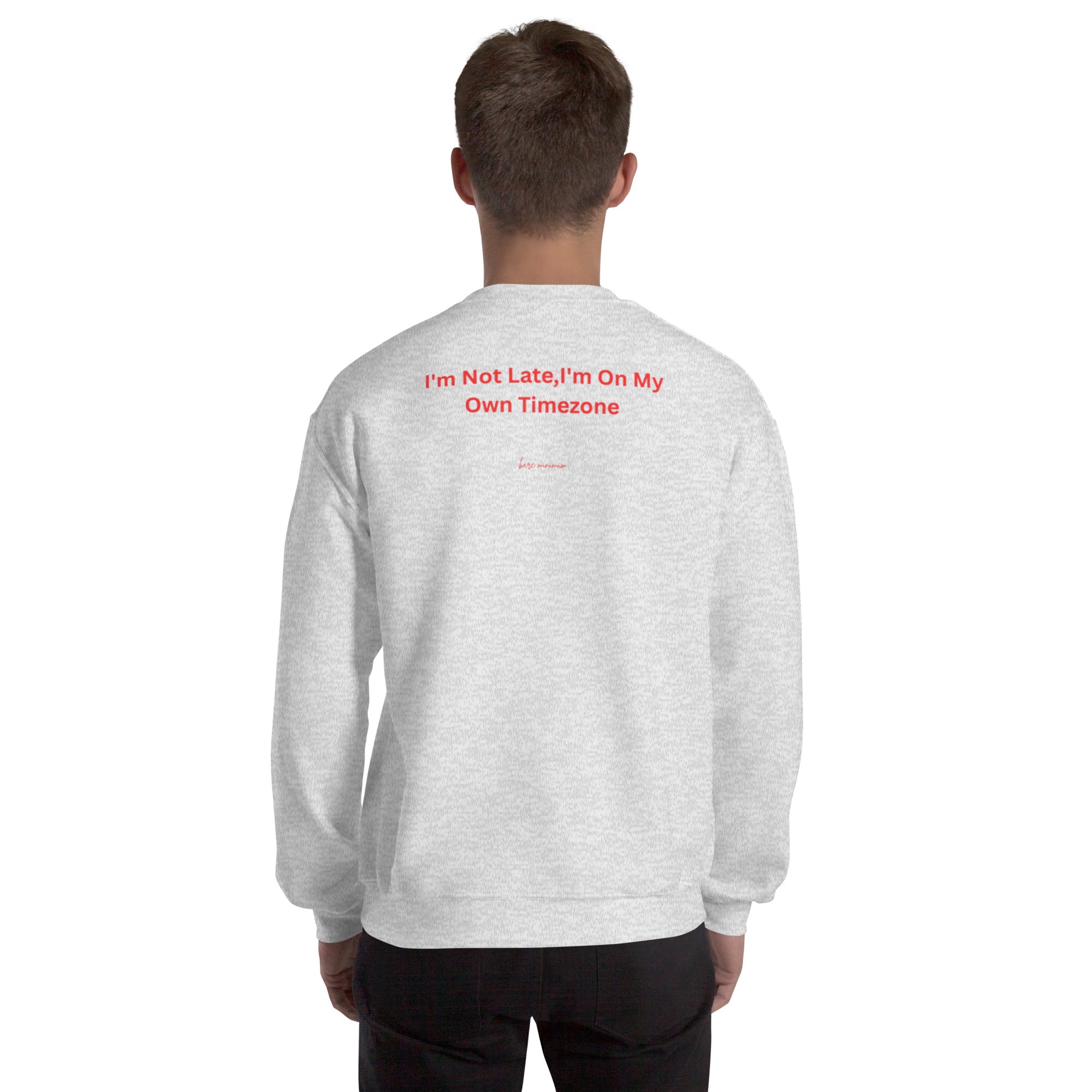 Person wearing a gray sweatshirt with 'sirtaz' logo on the back against a white background