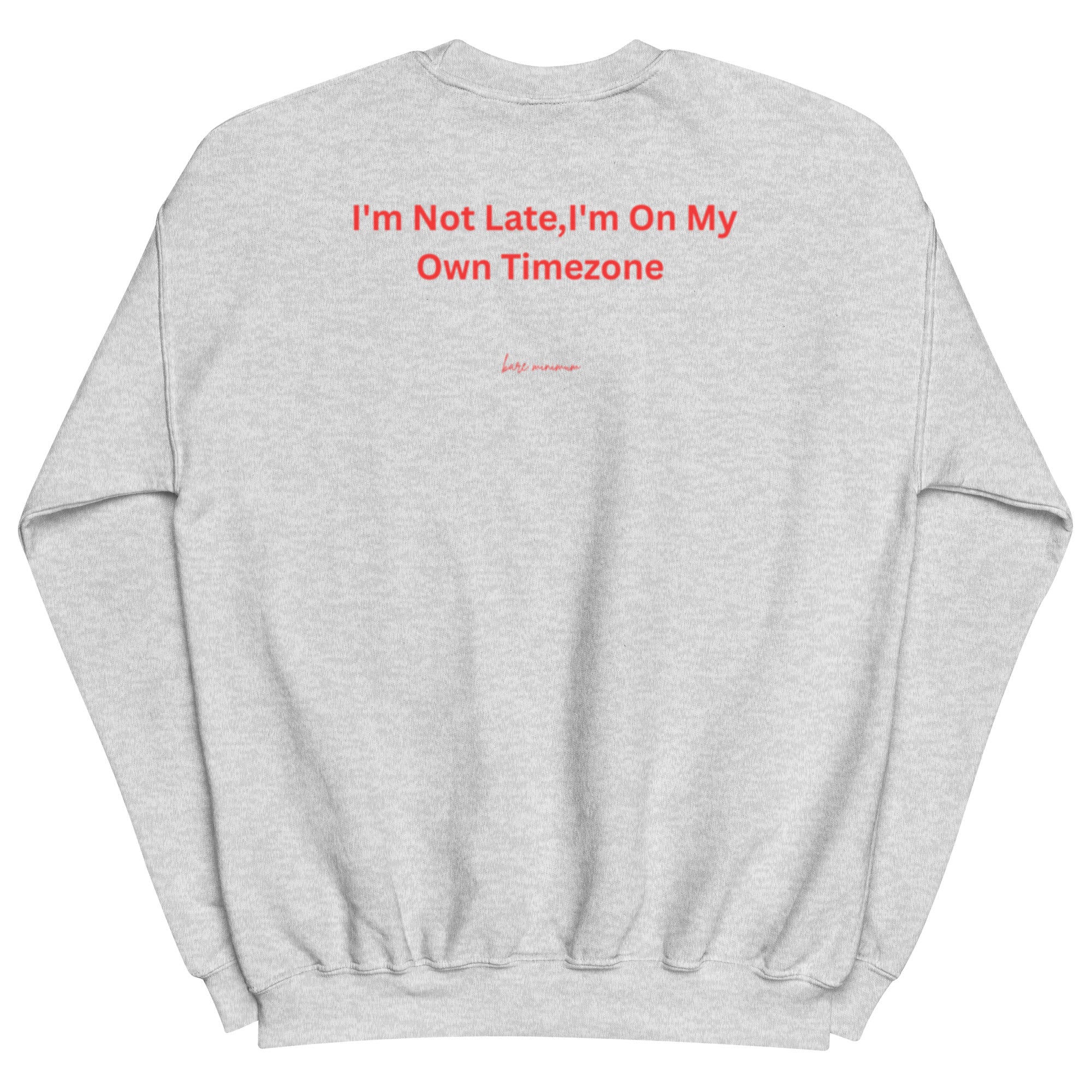 Gray sweatshirt with red text 'I'm Not Late, I'm On My Own Timezone' on a white background