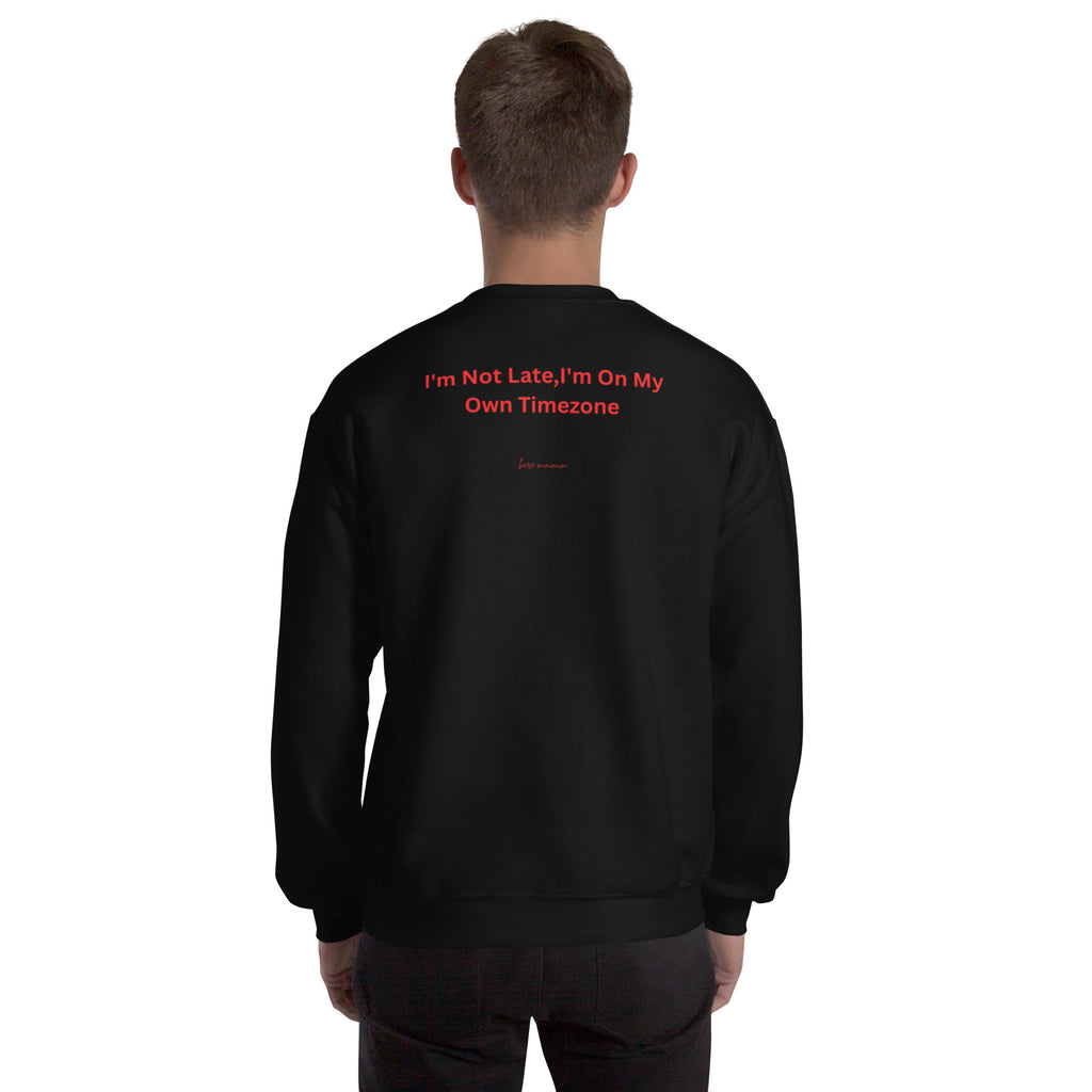Black sweatshirt with red text on the back, worn by a person on a white background