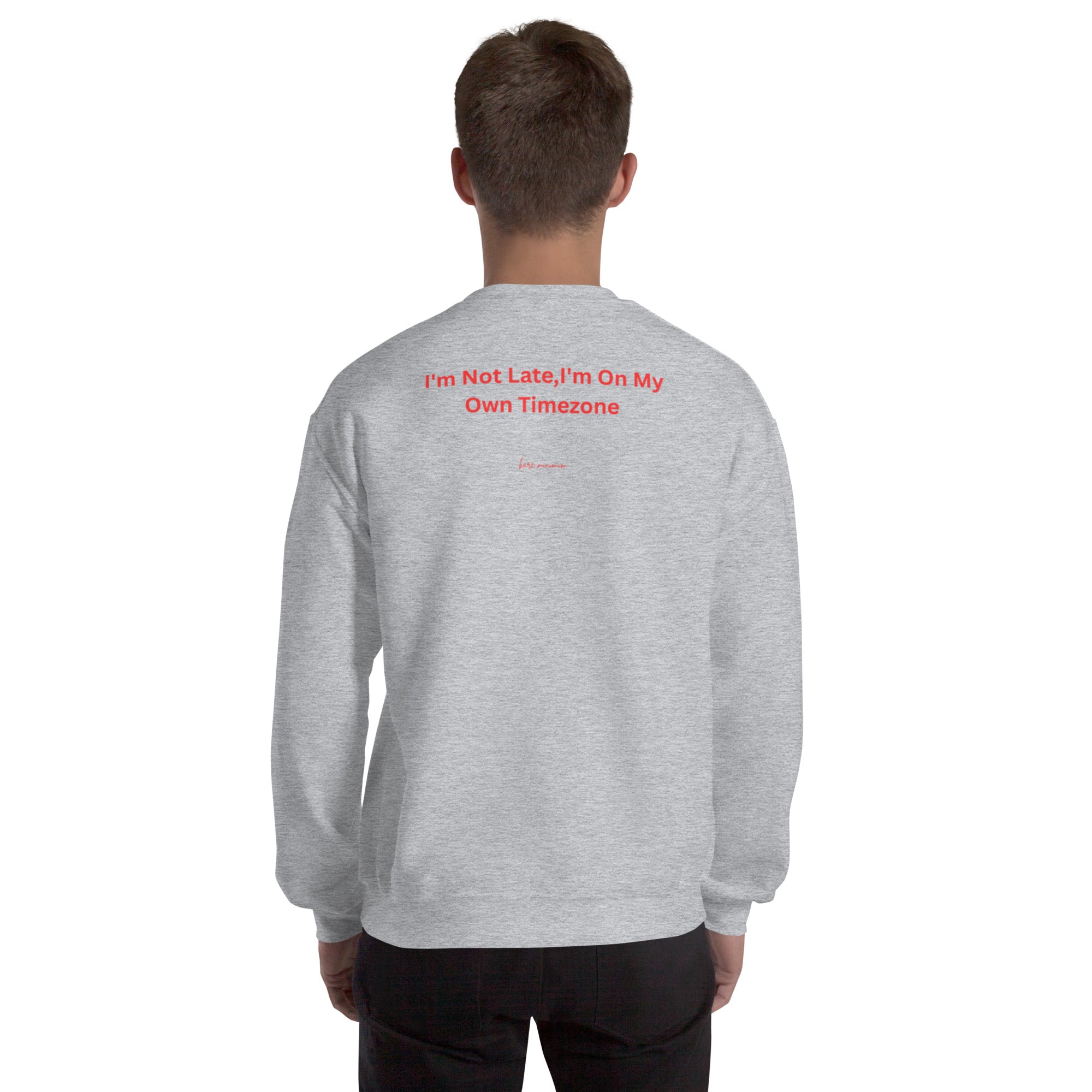 Person wearing a gray sweatshirt on a white background