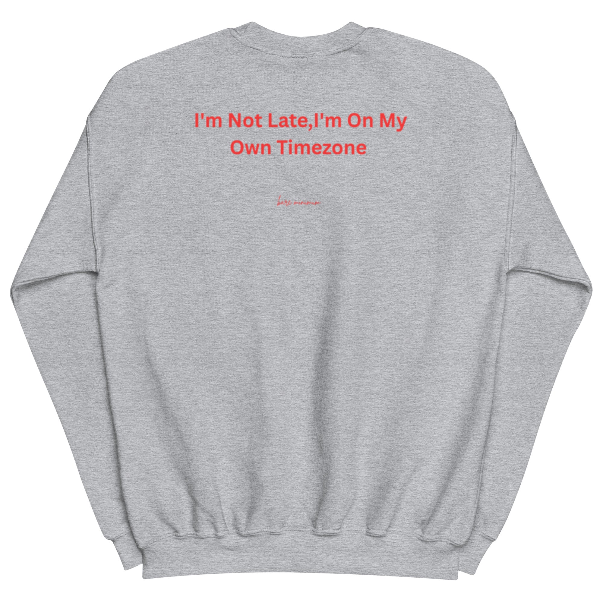 Gray sweatshirt with red text 'I'm Not Late, I'm On My Own Timezone' on a white background