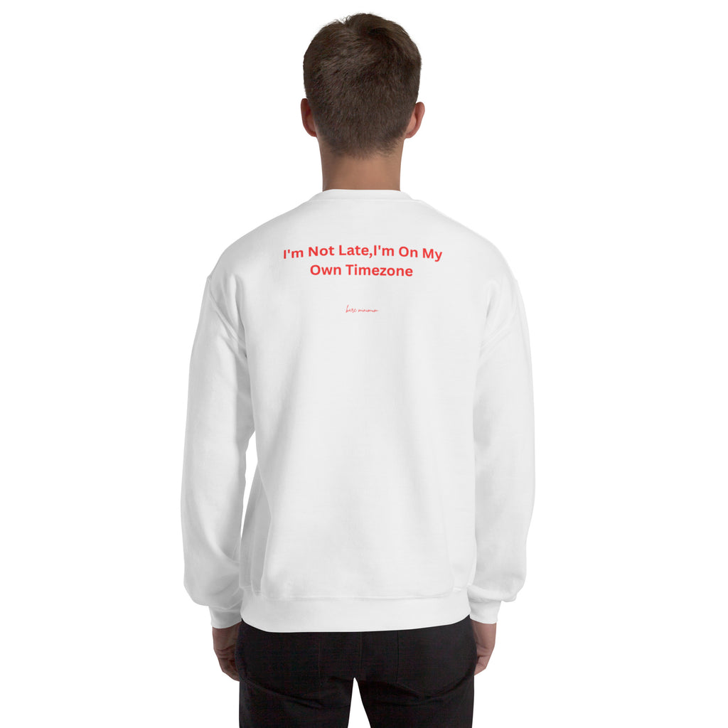 Person wearing a white sweatshirt with text on the back against a white background