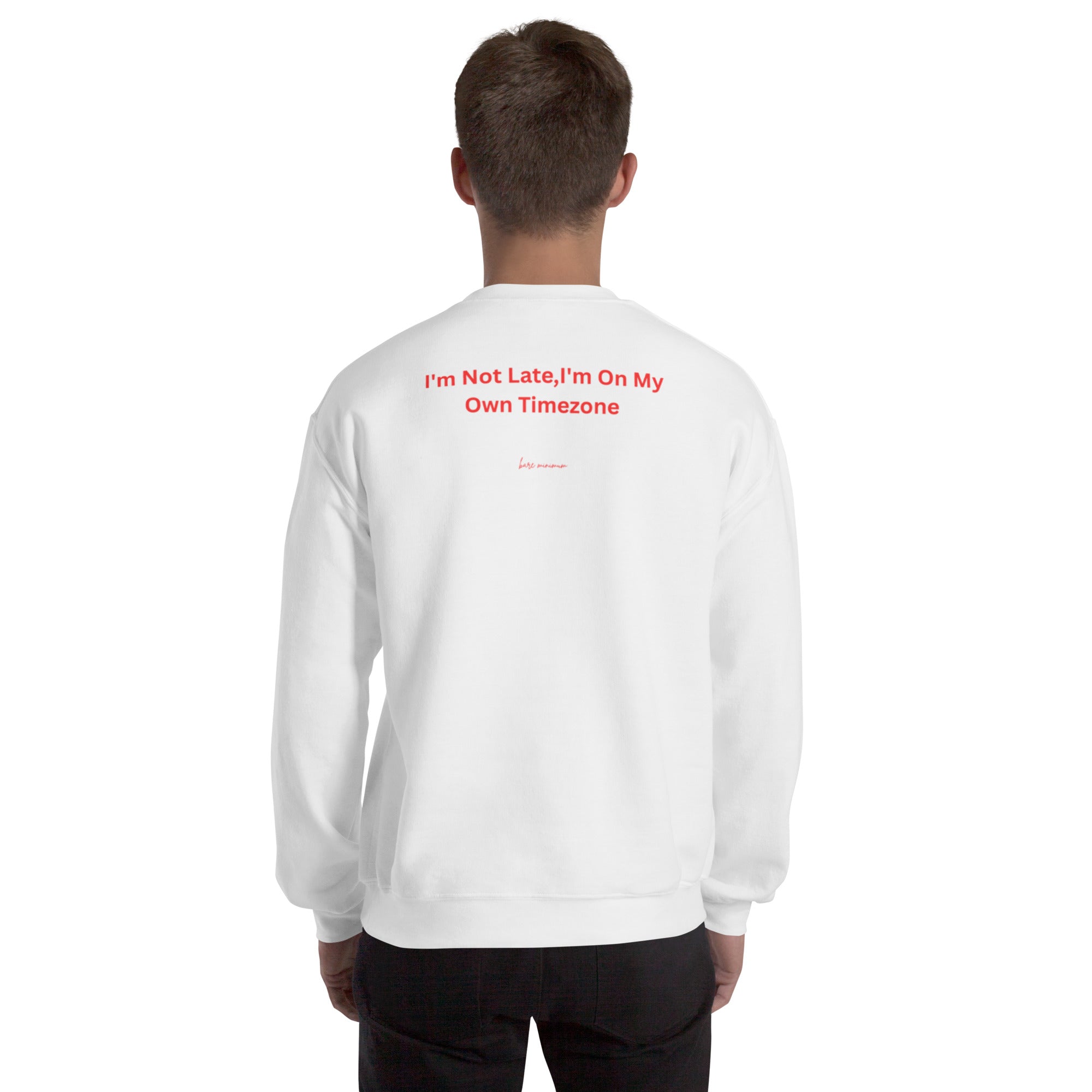 Person wearing a white sweatshirt with text on the back against a white background