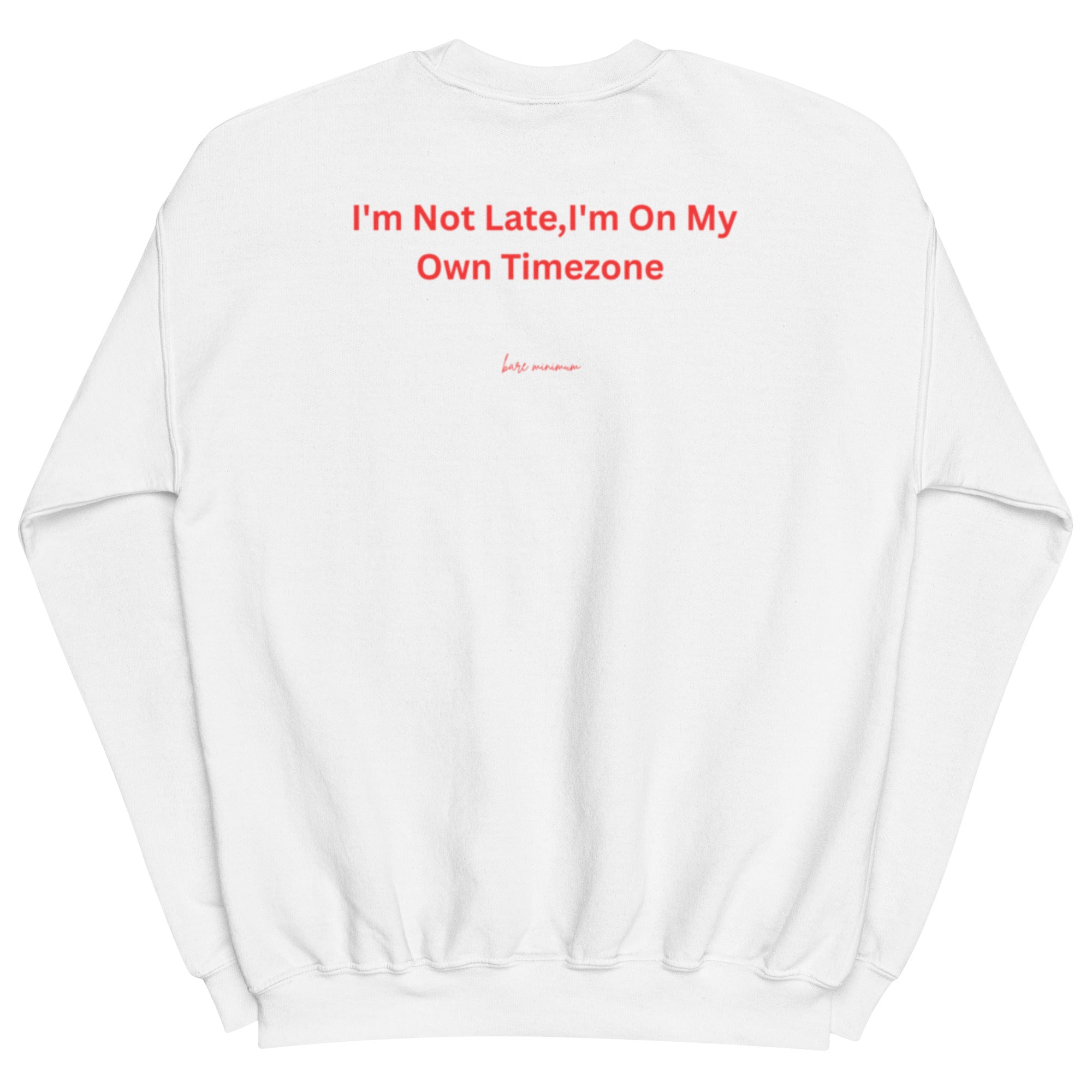 White sweatshirt with red text 'I'm Not Late, I'm On My Own Timezone' on a white background