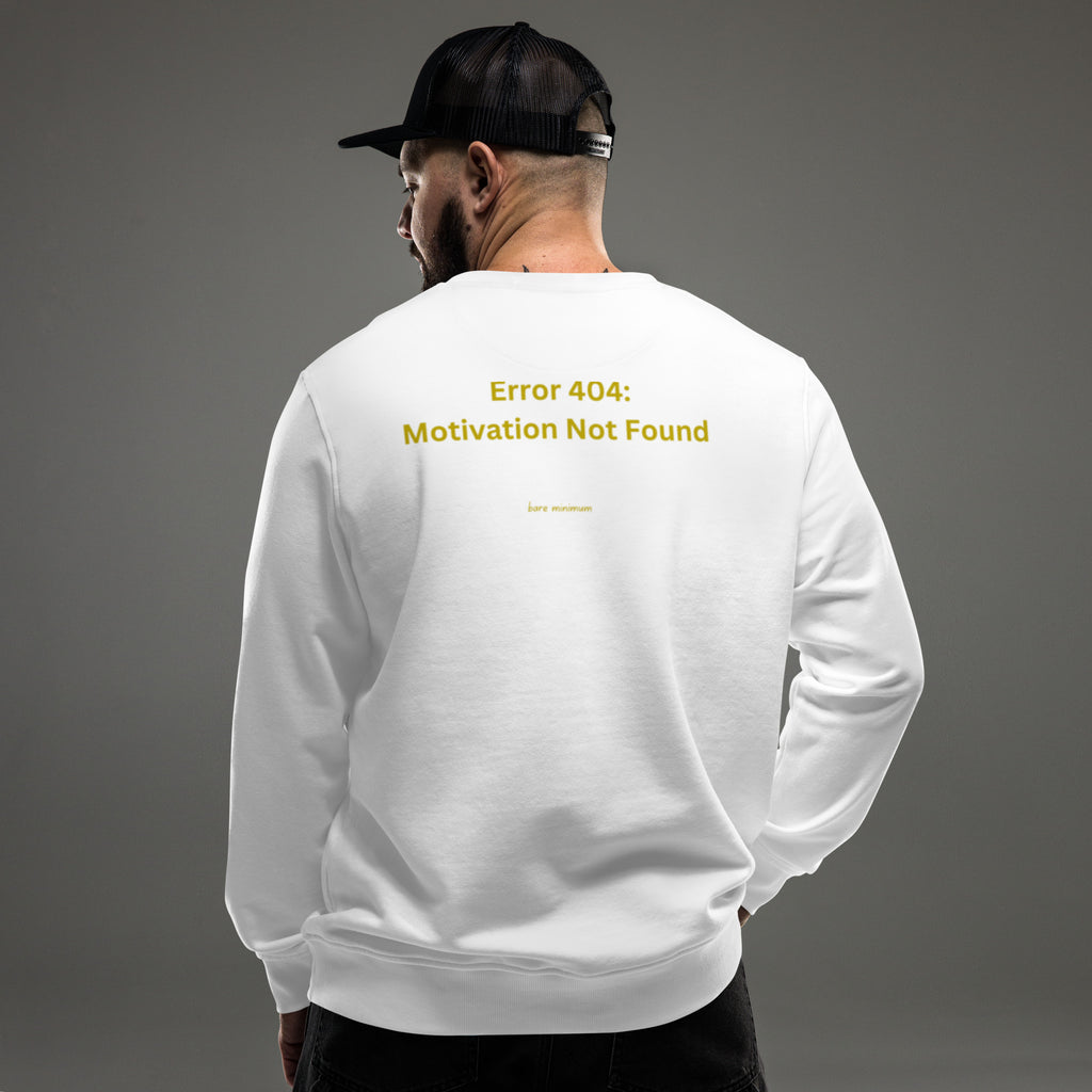 Person wearing a white sweatshirt with 'Eat More Breakfast' text on the back against a gray background